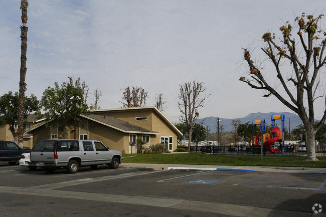 a car parked in a parking lot in front of a house